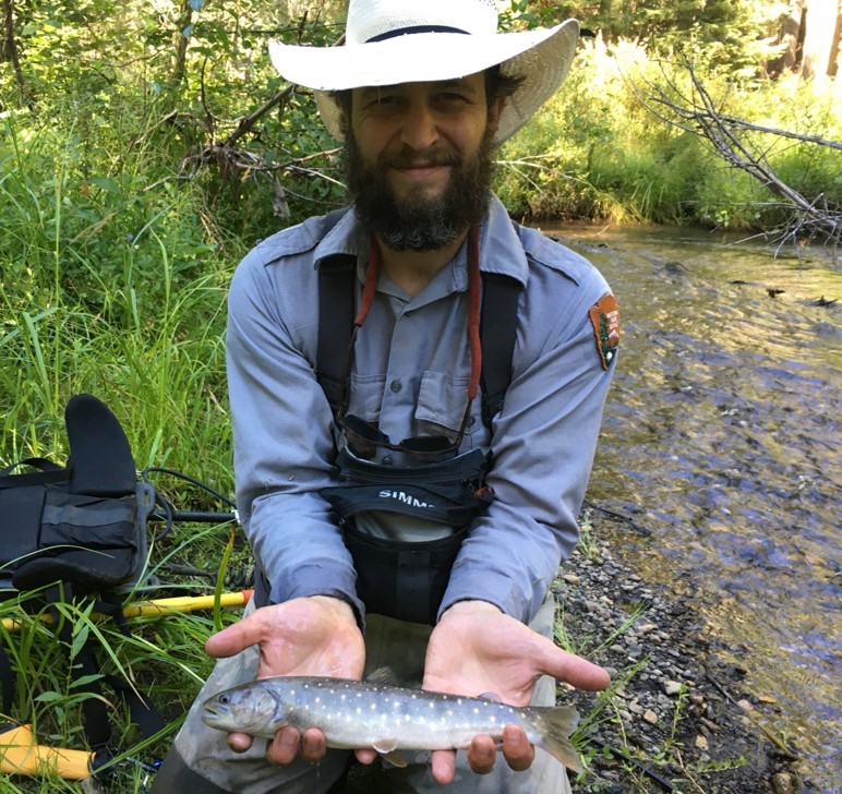 An image of Dave Hering holding a fish