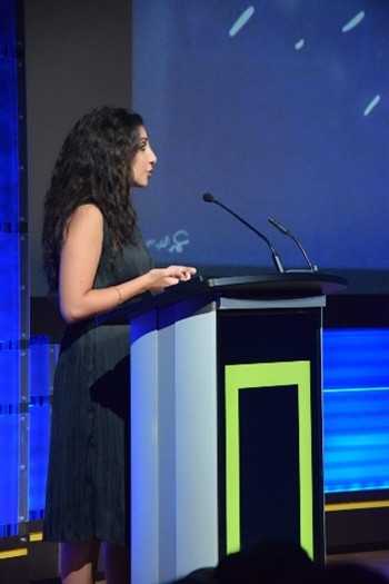 Woman standing at a podium