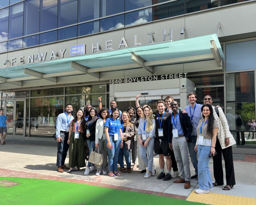 Group of Fulbright students standing outside hospital