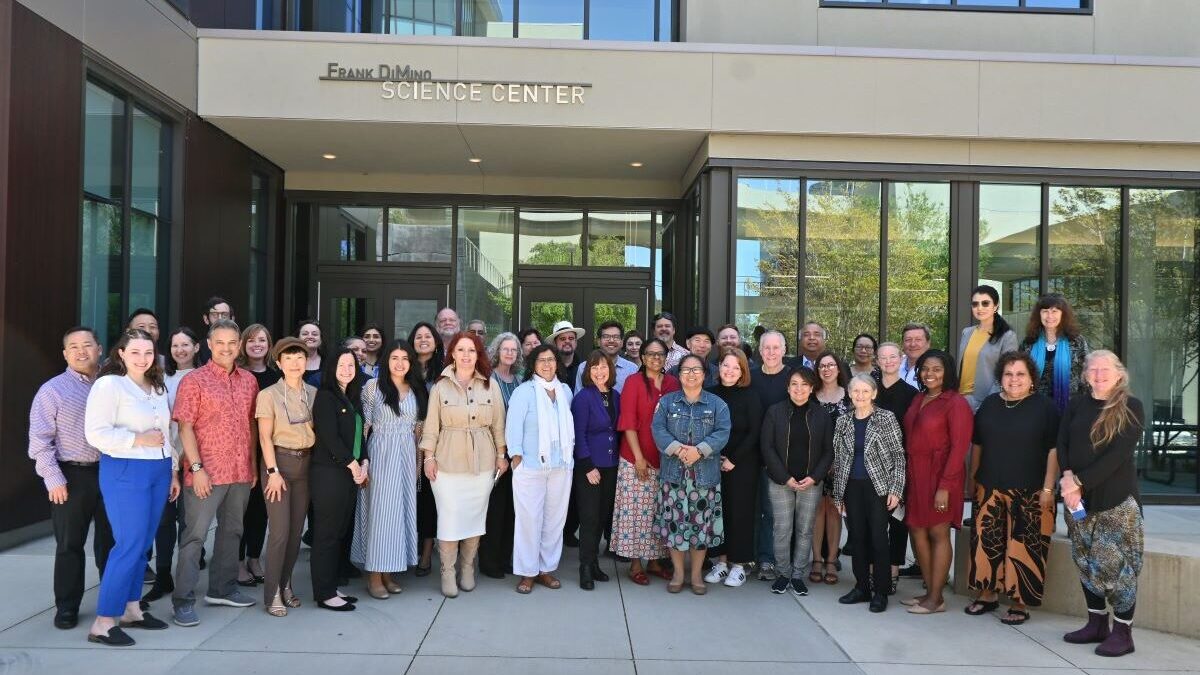 Group of Scholar liaisons standing outside Frank DiMino Science center