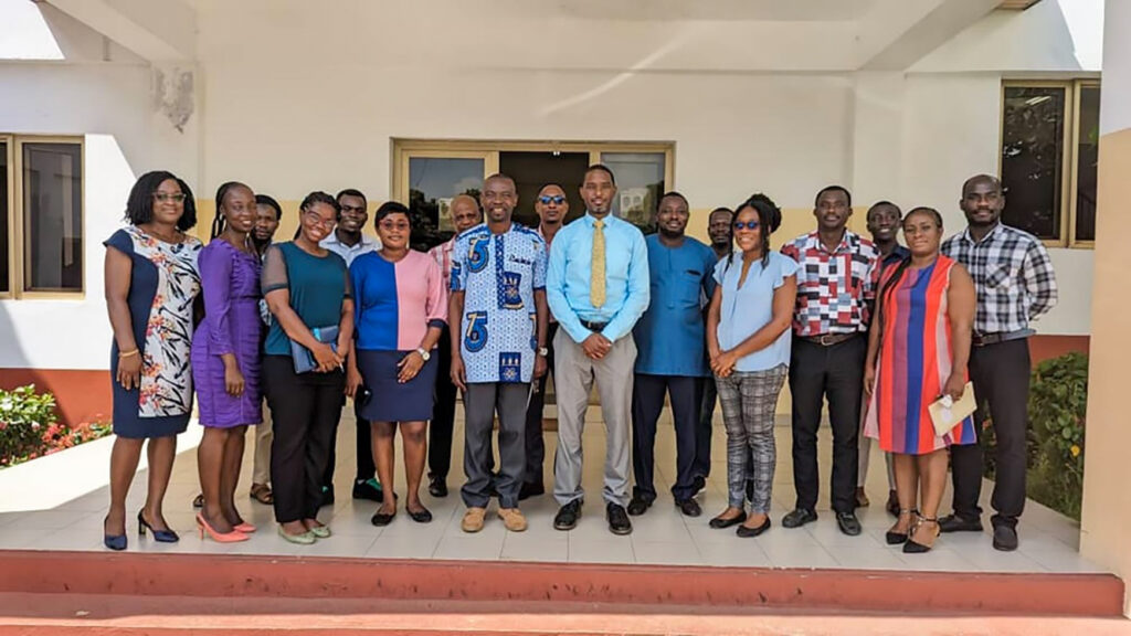 Karl Jackson standing with group of people at University of Ghana