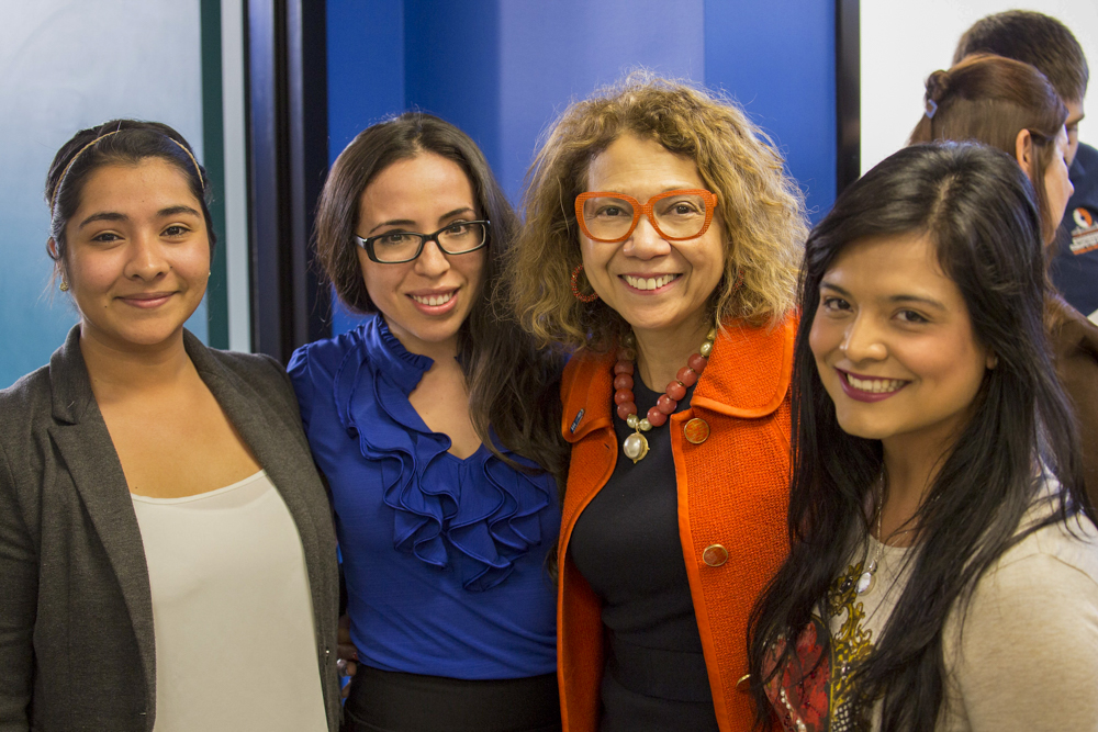 Mildred Garcia standing with three other women