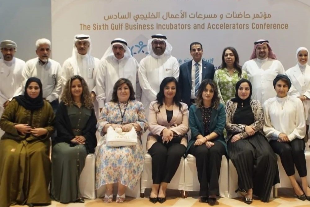 Susana Feurtes sitting with attendees of Sixth Gulf Business Incubators and Accelerators Conference